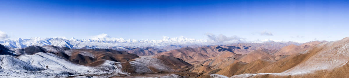 Panoramic views of the Himalayan mountain range seen from a high road in Tibet
