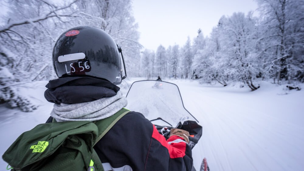 snowmobiling in lapland