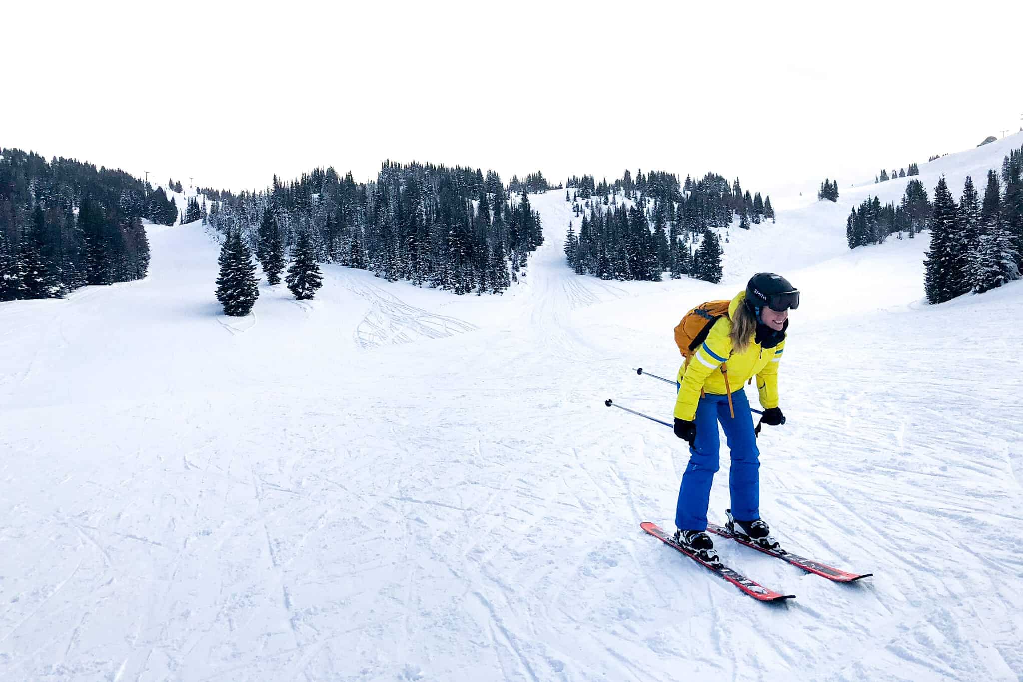Woman skis at Sunshine Village Ski Resort during a long winter in Banff