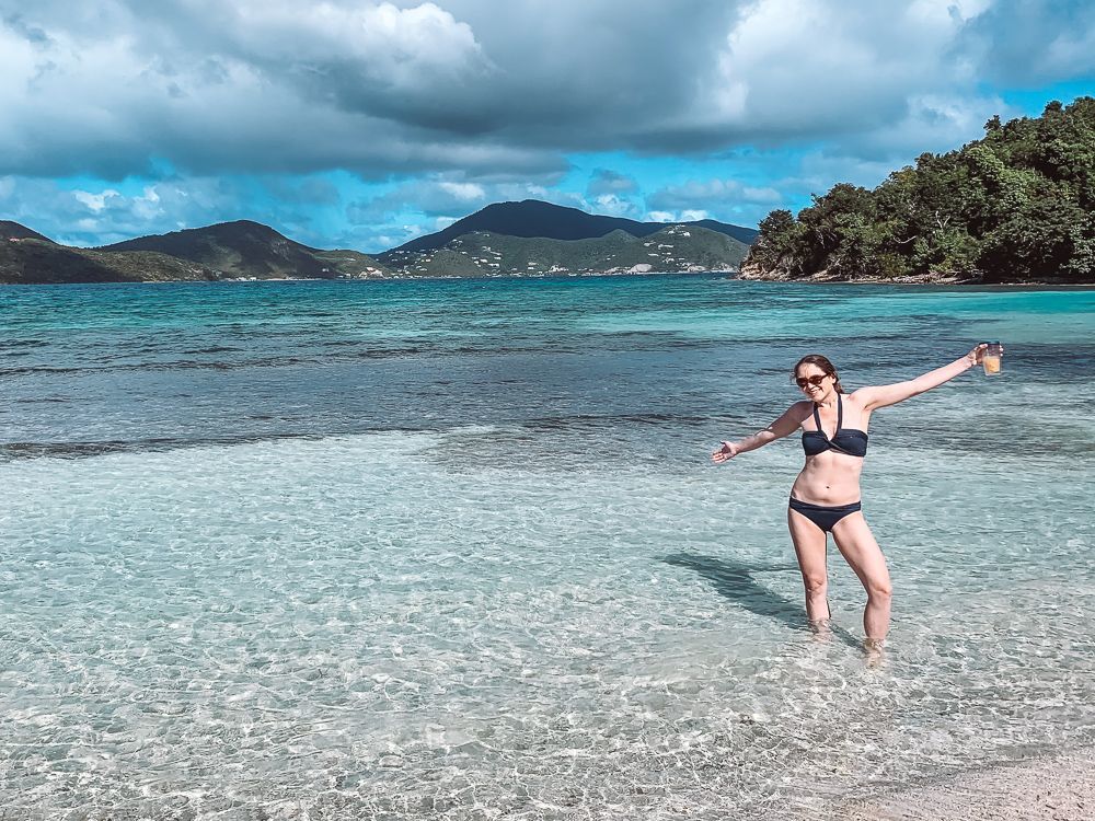 girl standing in shallow water of Brown Bay in St John USVI