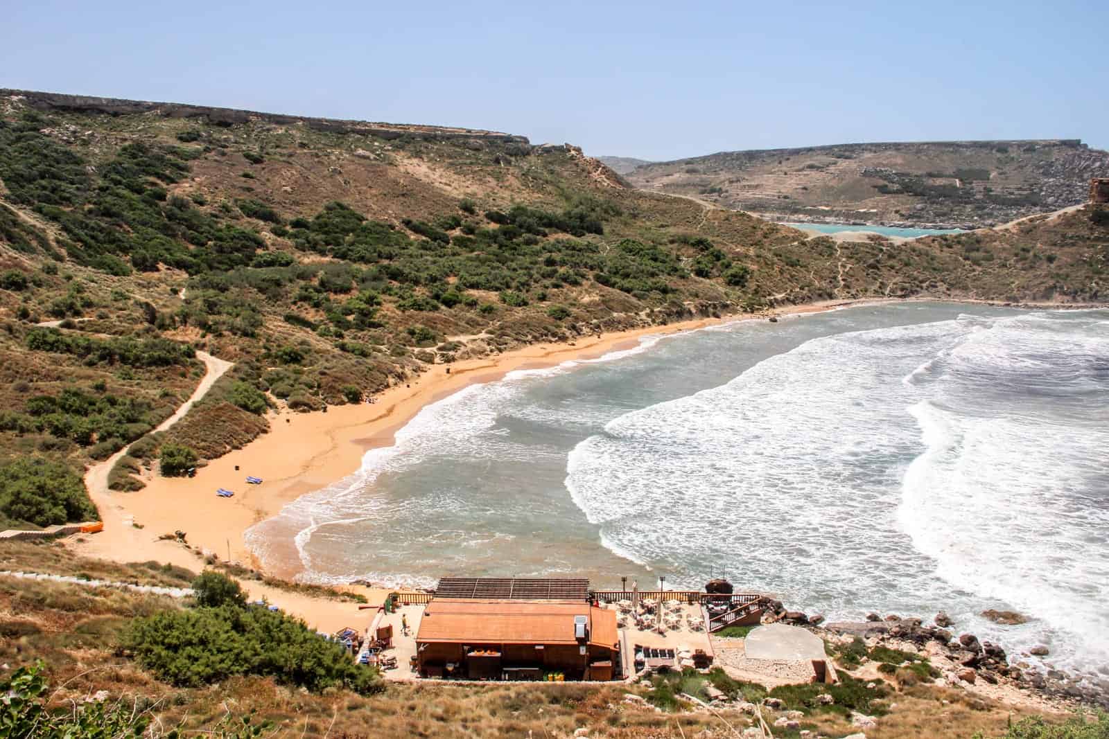 Elevated view of the beach and coastline at The beach at Ghajn Tuffieha in Malta