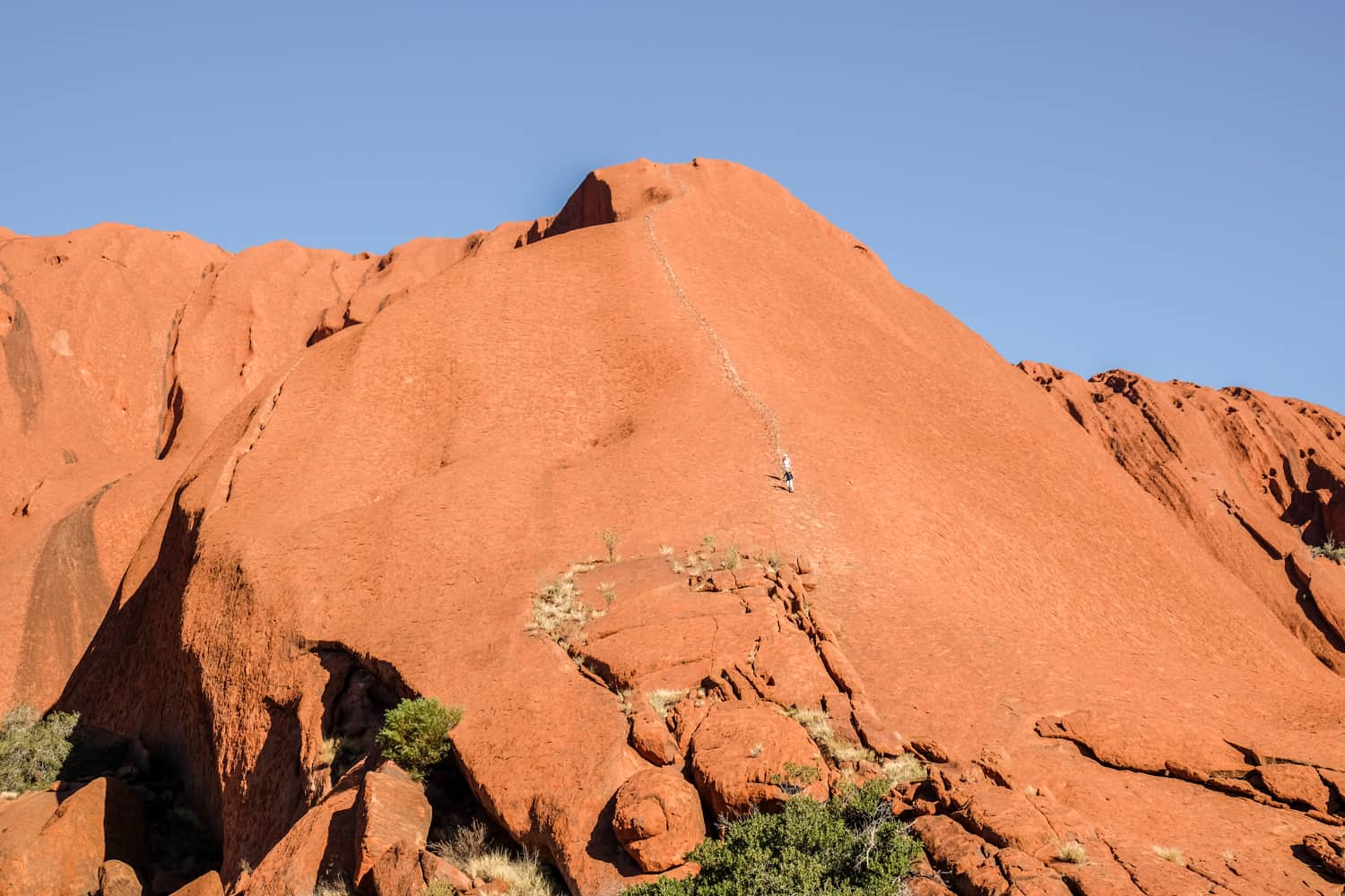 People wrongfully climbing Uluru, the Aboriginal name for Ayers Rock in Australia's Northern Territory. 