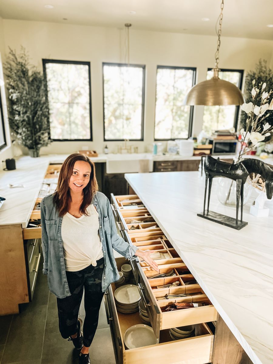 Annette organizing her kitchen cabinets