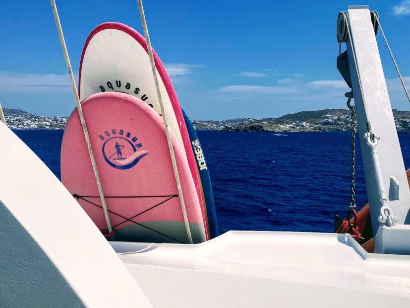 Stand up paddle boards on running on waves ship