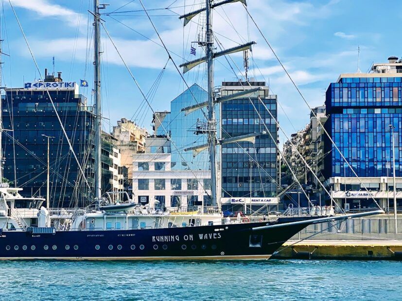 Running on waves luxury yacht in the Piraeus port of Athens