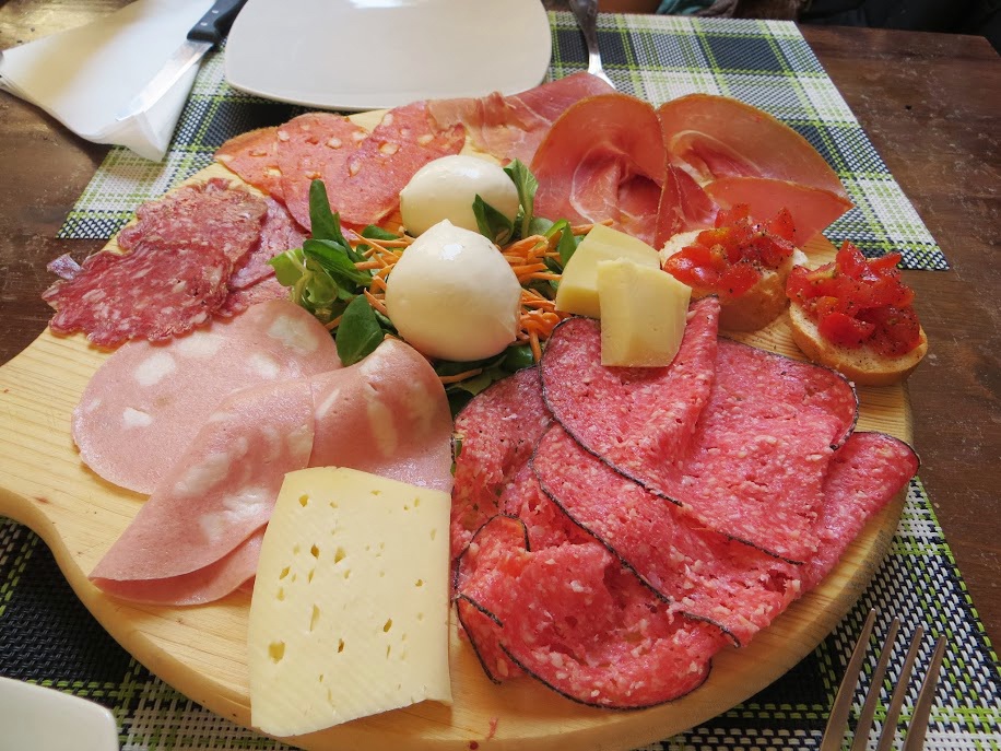Charcuterie board of cured meats and cheese in Rome italy