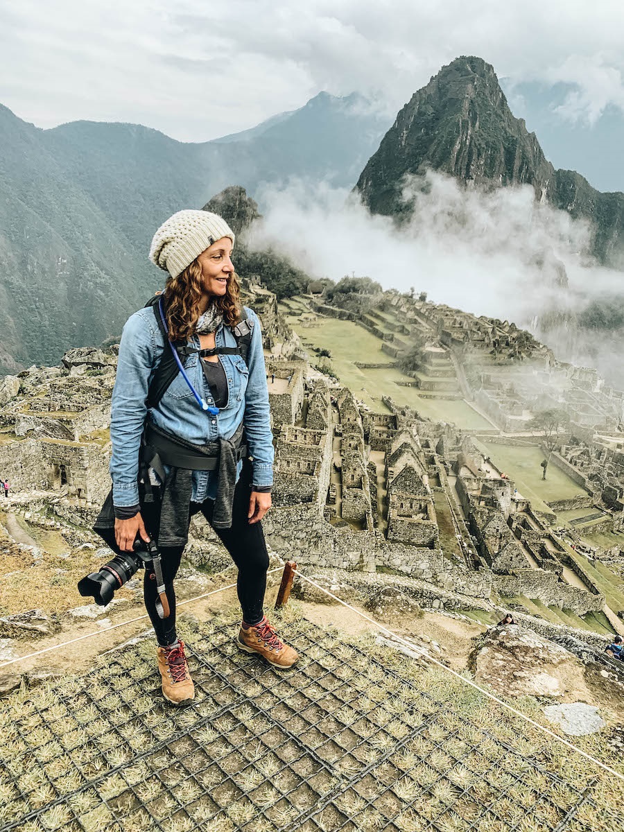 Annette standing at Historic Sanctuary of Machu Picchu, Peru