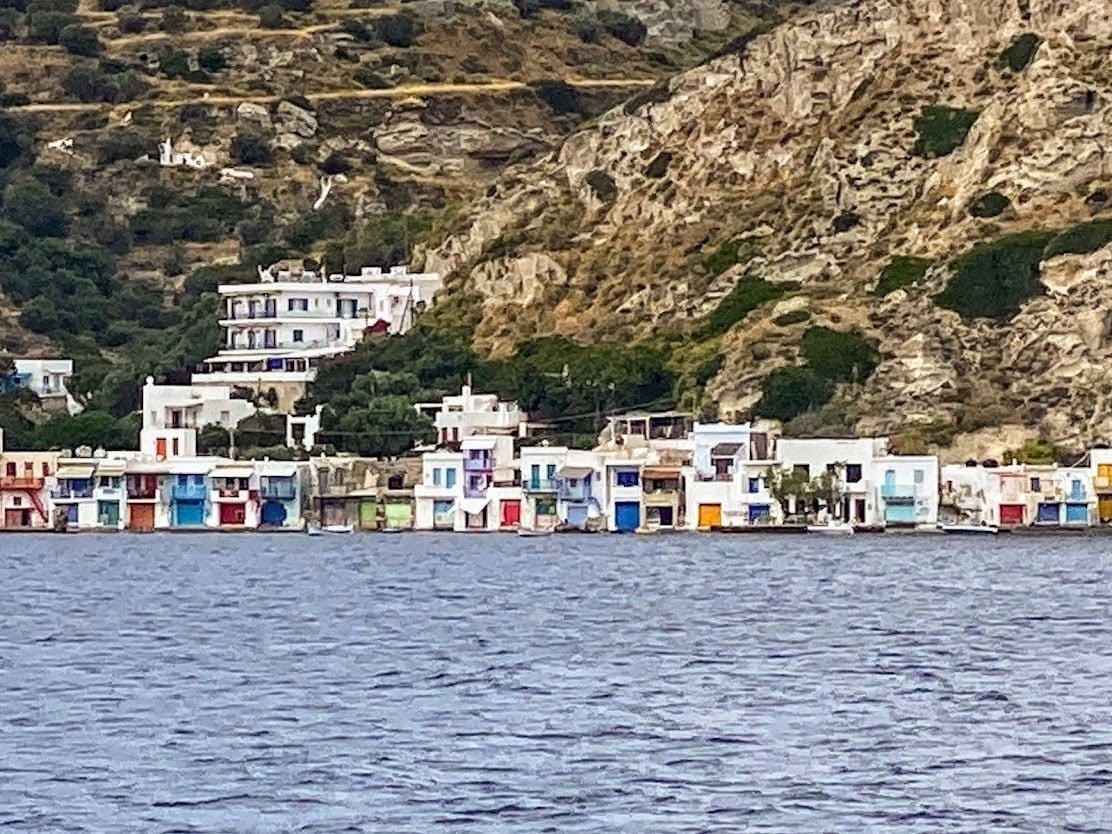Syrmata solourful fisherma houses seen from the water