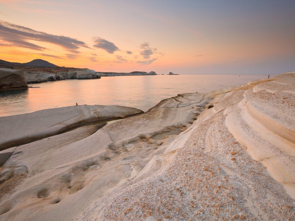 white rock sarakaniko beach at sunset in Milos