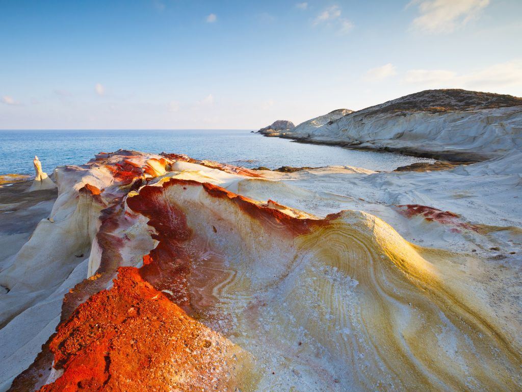 Rust red coloured volcanic beach in Milos