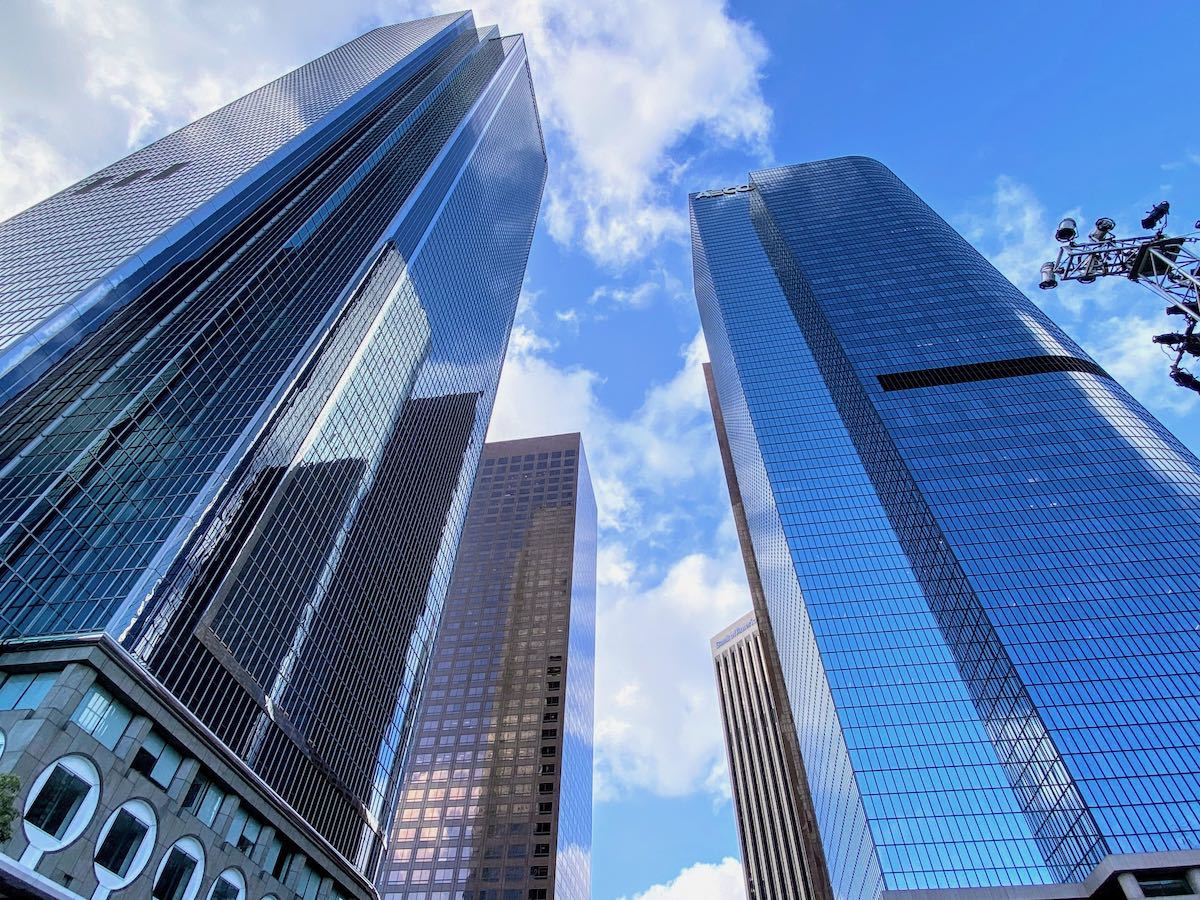 Modern Skyscrapers in downtown LA reflecting blue sky