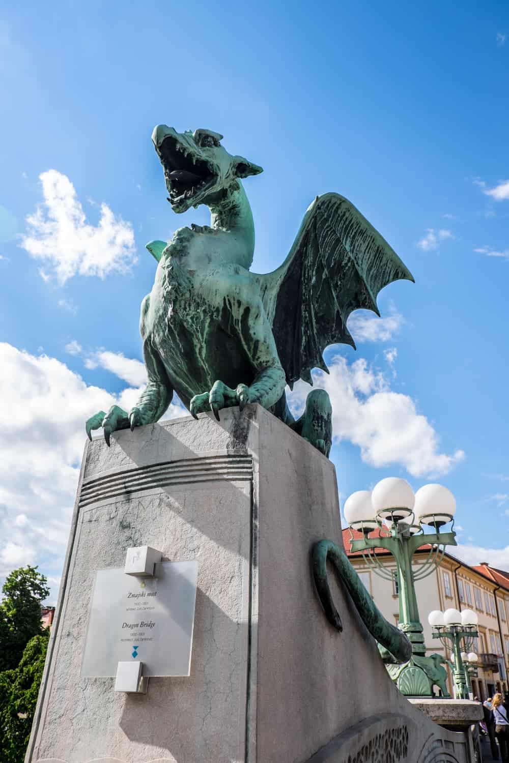 Green dragon at the end of The Dragon’s Bridge in Ljubljana Old Town