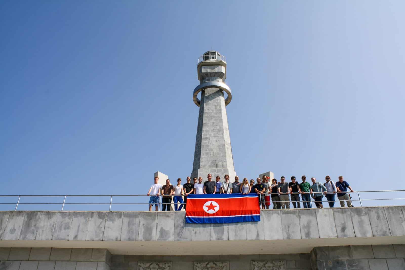 A Koryo Tours group travels to North Korea and visits a monument in Pyongyang