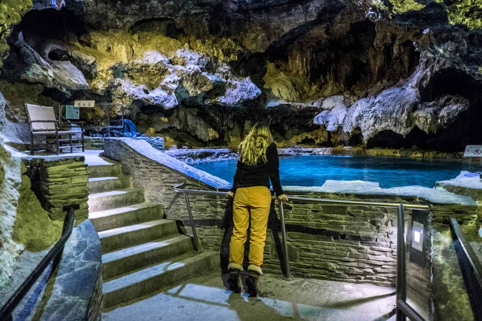 Women looking into the Banff Cave & Basin, Canada