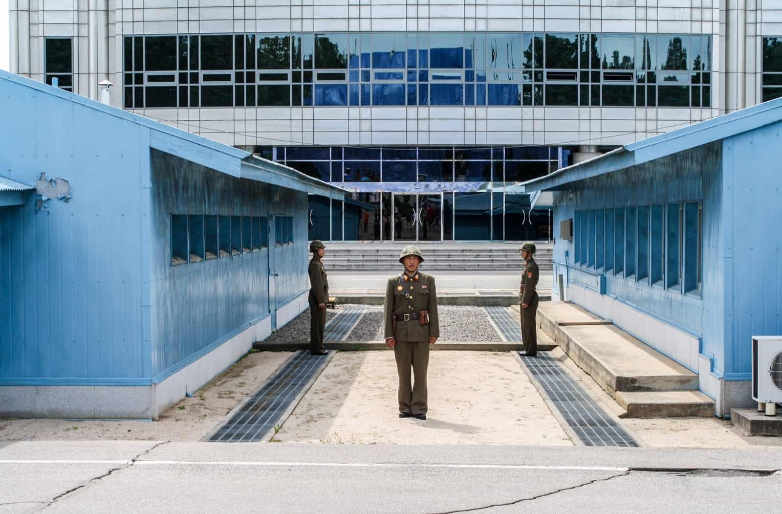 North Korean guards on the border when you visit the DMZ in North Korea