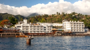 Fort Young Hotel amongst the hills of Dominica as seen from the ocean