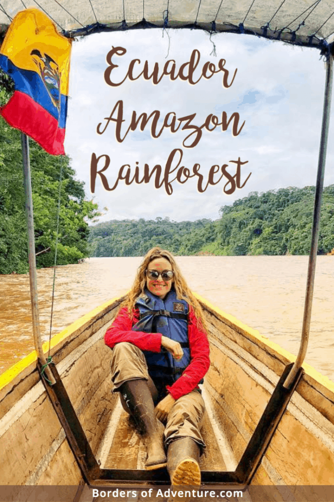 A woman wearing a red jacket, khaki trousers and black boots sitting on a wooden boat with the Ecuador Flag flying, on the muddy yellow waters. Text reads: "Ecuador Amazon Rainforest". 