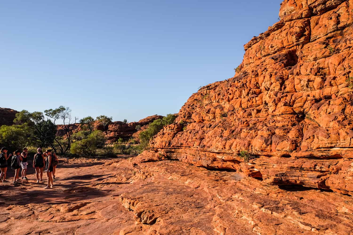 Travellers on the Kings Canyon Hike in the Australian Outback.