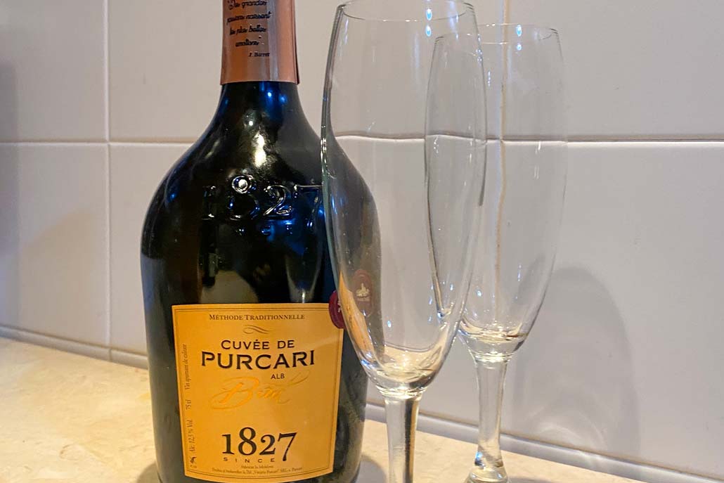 Sparkling wine from Moldova with two empty wine glasses