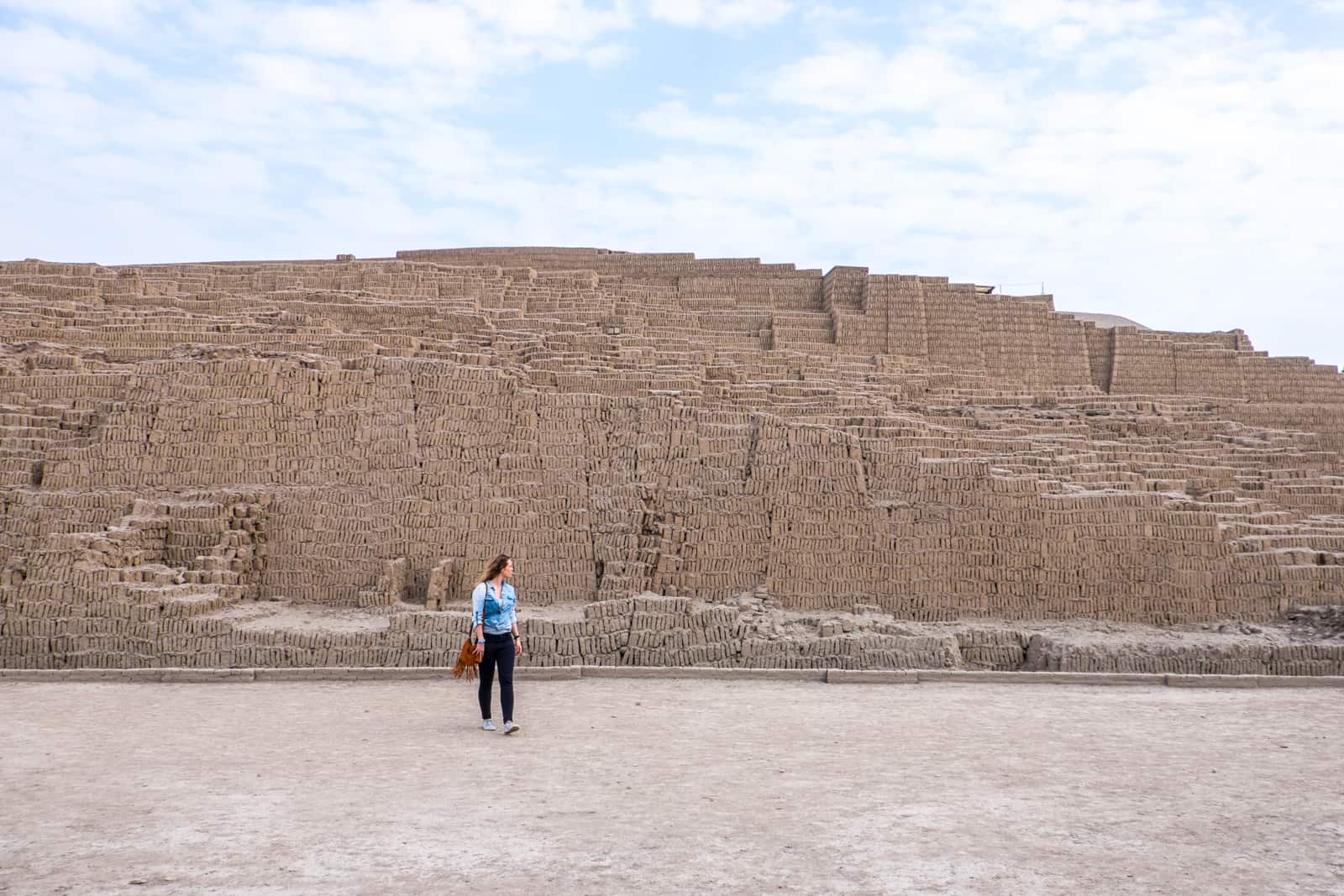 A tourist visiting the Huaca Pucllana Inca Ruins in Lima, Peru. 