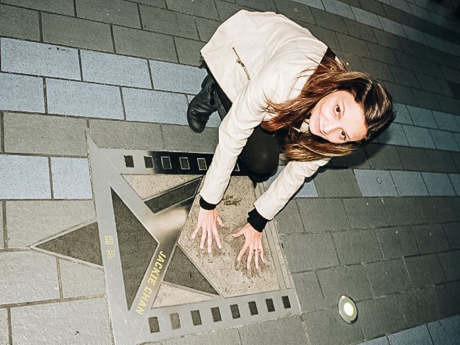 Annette holding a star at Avenue of Stars