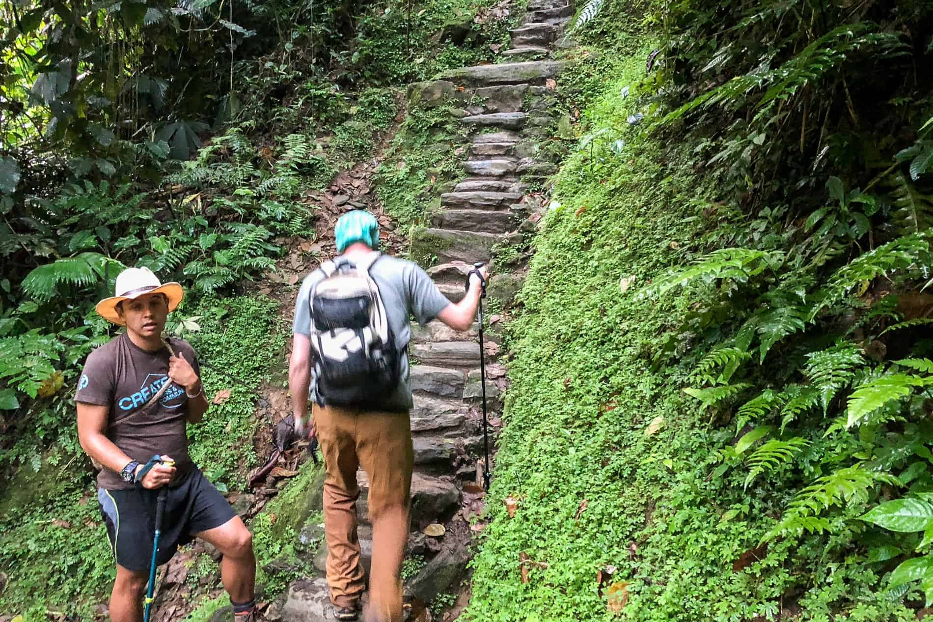 A trekker climbing the 1,200 stairs to the Lost City in Colombia.
