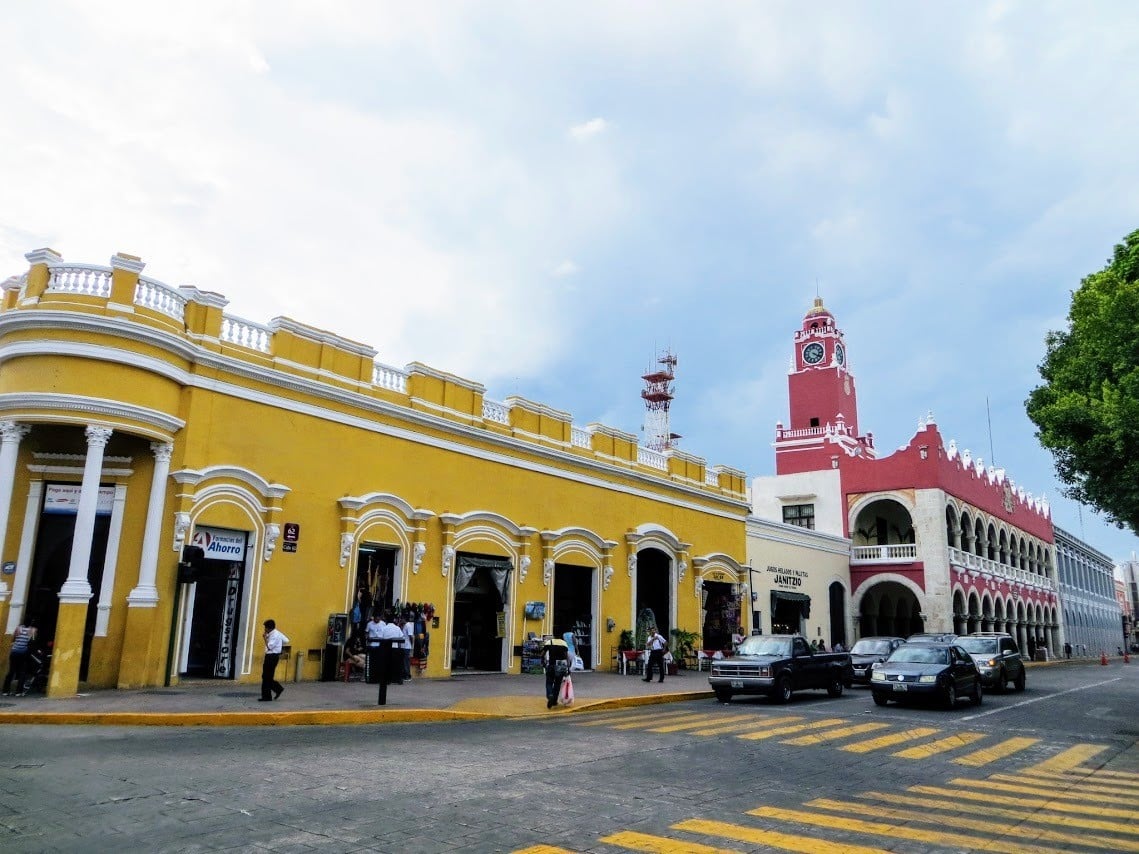 Yellow and red Spanish colonial buildings in Merida capital of Yucatan