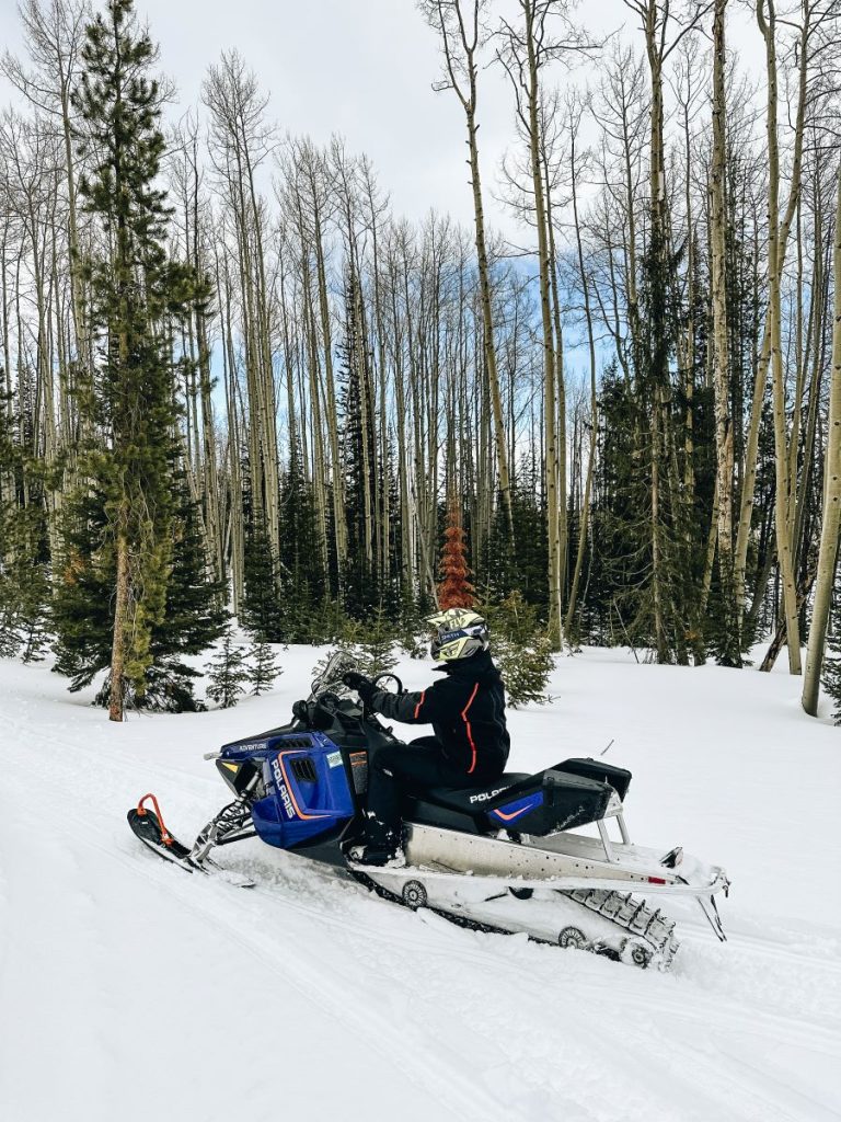 Peter enjoying the snowmobile at Vista Verde Guest Ranch Colorado